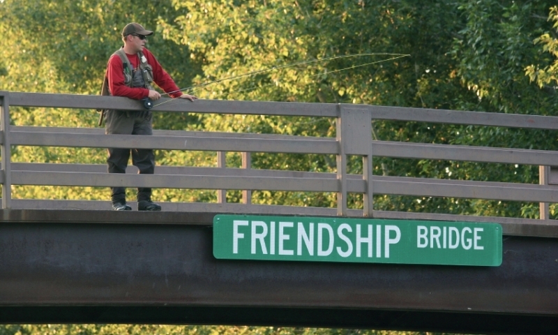 Fishing from Friendship Bridge along the Boise River